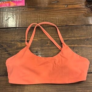 Born Primitive coral sports bra